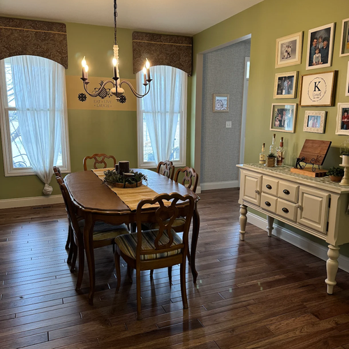 Dining room in a Cottleville, MO with new Harwood floors